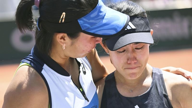 Tennis star in tears as she struggles to answer questions about disqualification | CNN